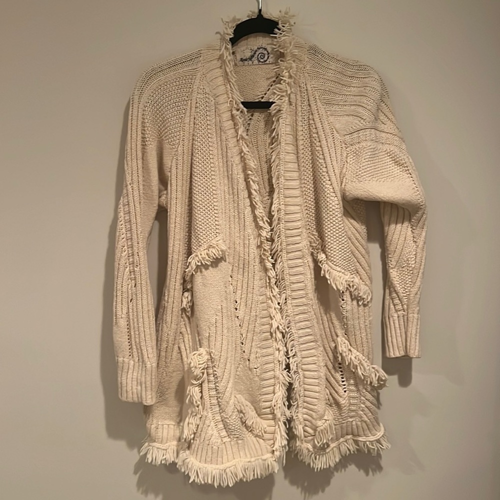 Fun chunky cream sweater from Athropologie